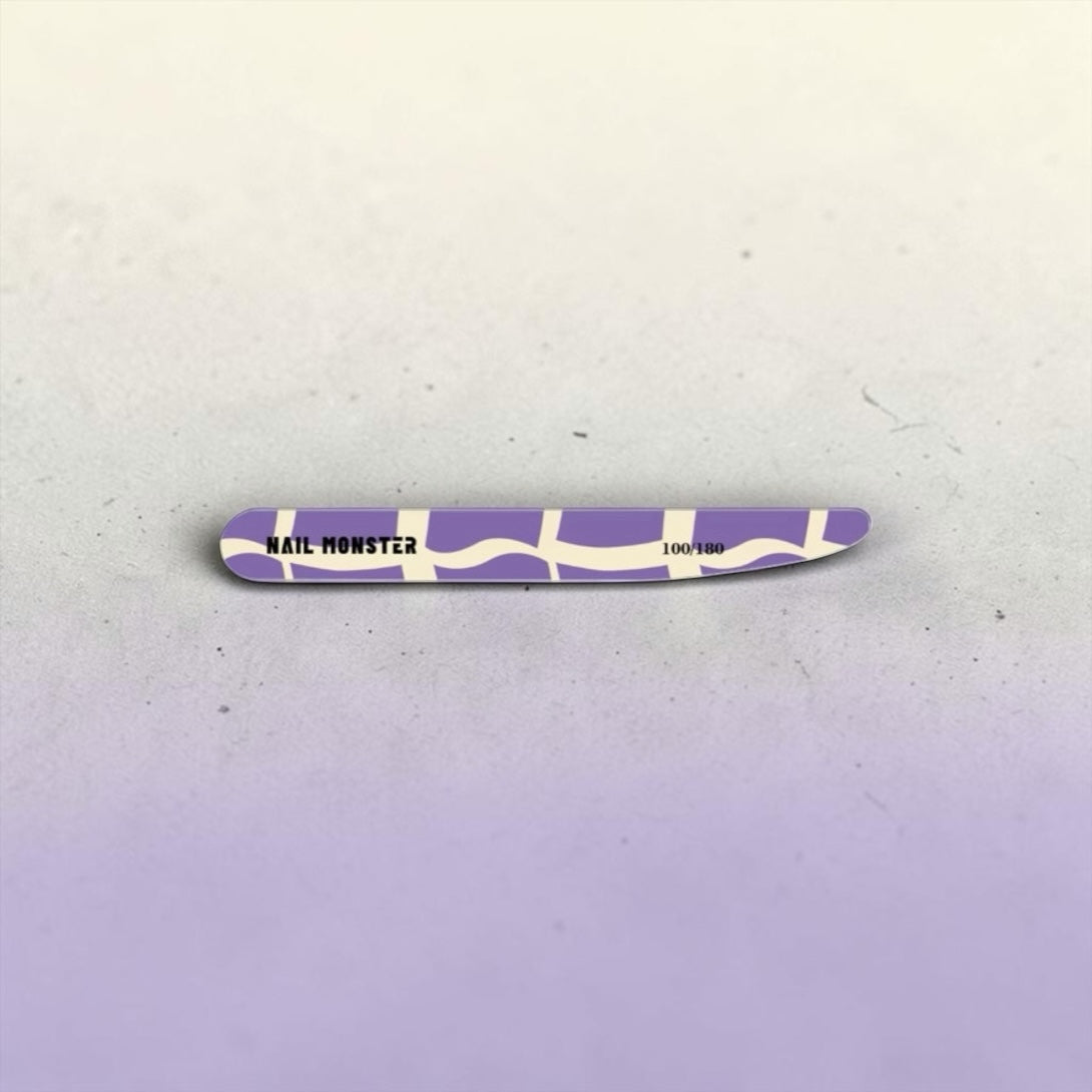 Nail Monsters 100/180 grit dual-sided nail file with a purple and white abstract pattern for professional manicures.