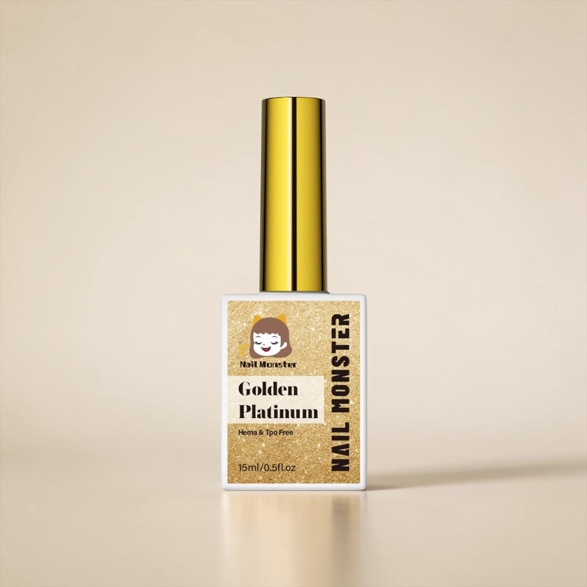 Nail Monsters Golden Platinum gel polish in a 15ml bottle with a metallic gold cap and glittery gold finish.