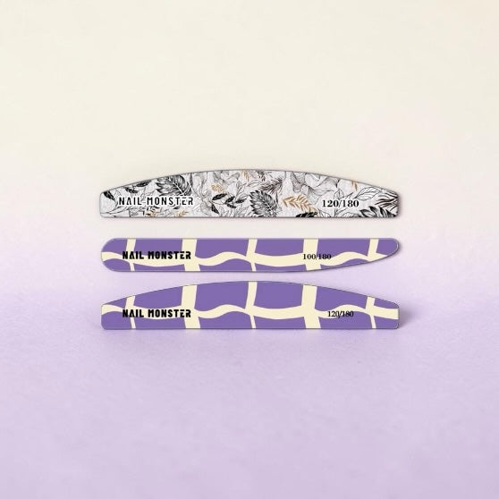 Nail Monsters professional dual-sided nail file set featuring purple geometric and black and white floral patterns.